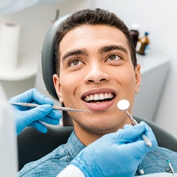 Man receiving dental checkup in Groveport