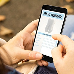 Checking dental insurance information on a cell phone