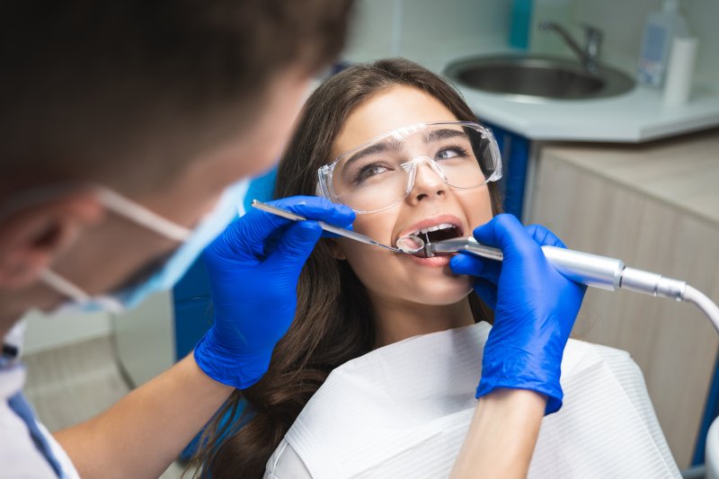 A dental patient getting a root canal 